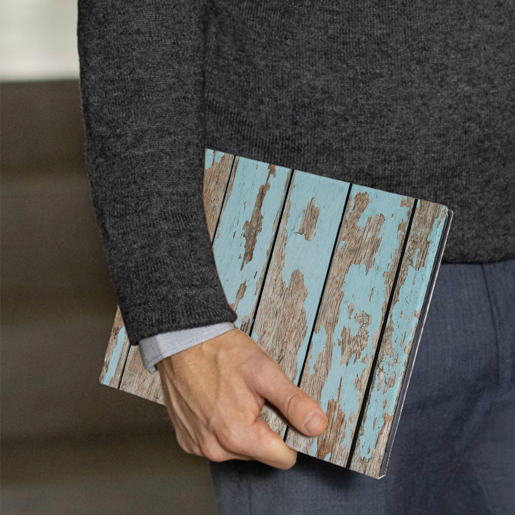 A business man holds Personalized VistaCase reMarkable Pen Holder Case with Wood design