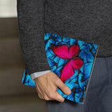 A business man holds Personalized VistaCase reMarkable Pen Holder Case with Butterfly design