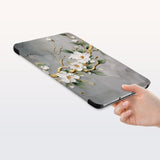 a hand is holding the Personalized Samsung Galaxy Tab Case with Flower Painting design