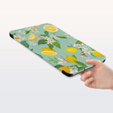 a hand is holding the Personalized Samsung Galaxy Tab Case with Tropical Fruits design