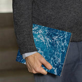 A business man holds Personalized VistaCase reMarkable Pen Holder Case with Ocean design