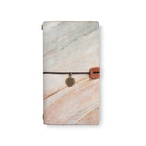 the front top view of midori style traveler's notebook with 5 design