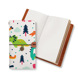 opened midori style traveler's notebook with Dinosaur design